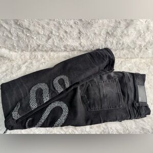 AMIRI Black Jeans with Silver Snake Detail